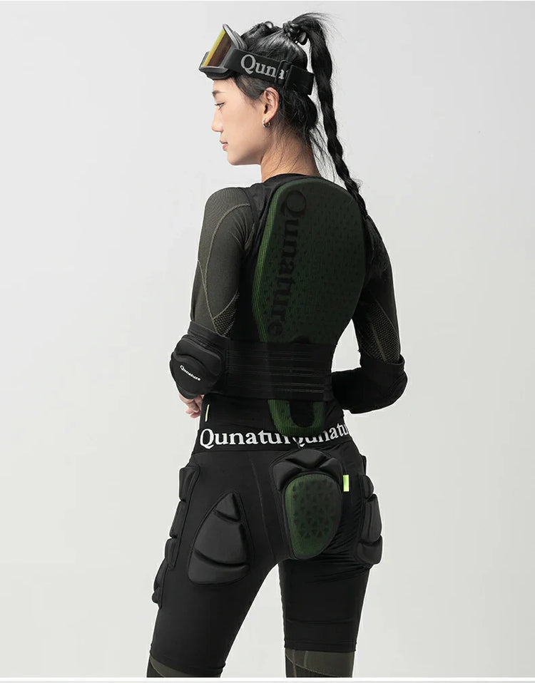 A woman wearing a black sports shockproof suit