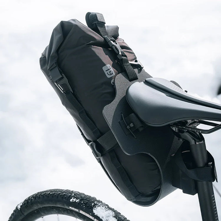 A strap holding a seat cushion to a bicycle