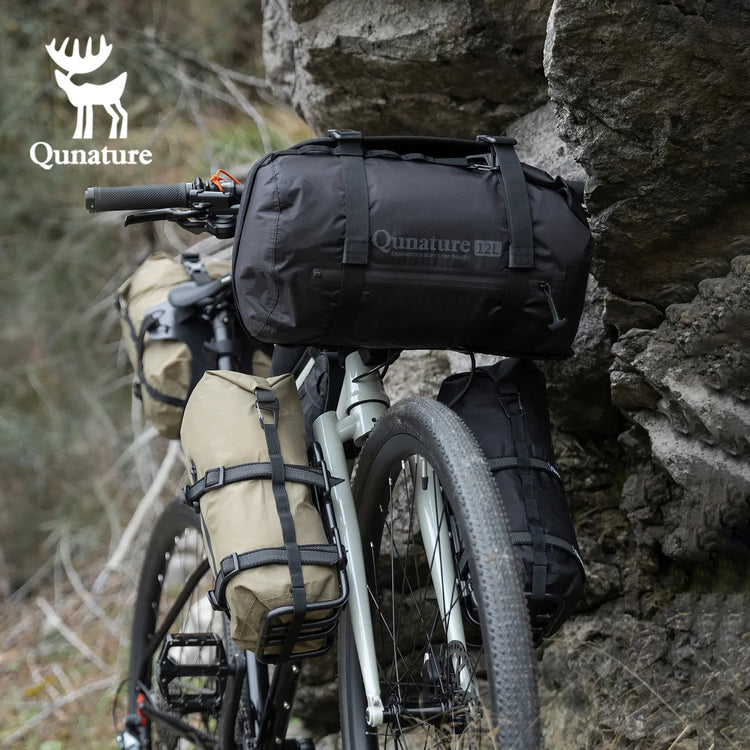 A bicycle filled with storage bags outdoors