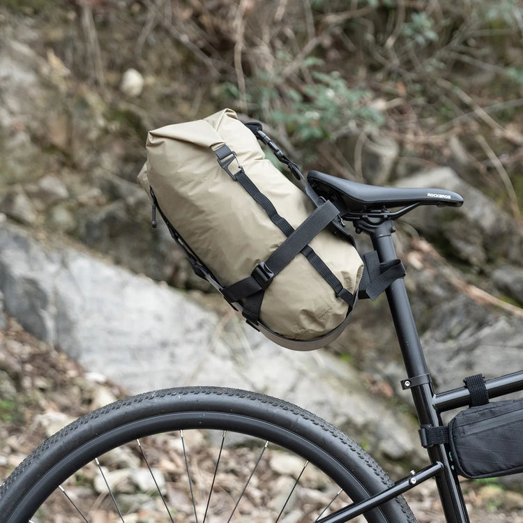 A bicycle filled with storage bags outdoors