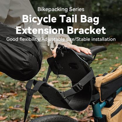 Bicycle tail bag extension bracket being attached to a bike with text highlighting features.