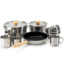 A 304 stainless steel camping cookware set with Teflon coating, including pots with lids, a frying pan, and cups.