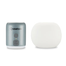 Gray device with control panel and a white spherical object on a white background, branded 'Qunature'.