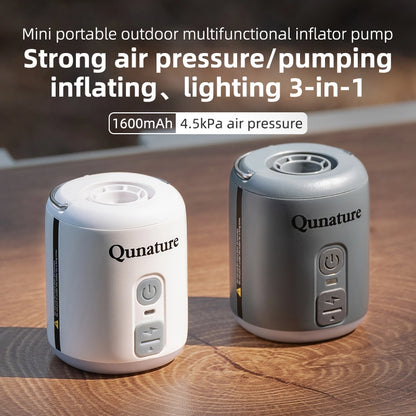 Two Qunature mini portable outdoor multifunctional inflator pumps on a wooden surface.
