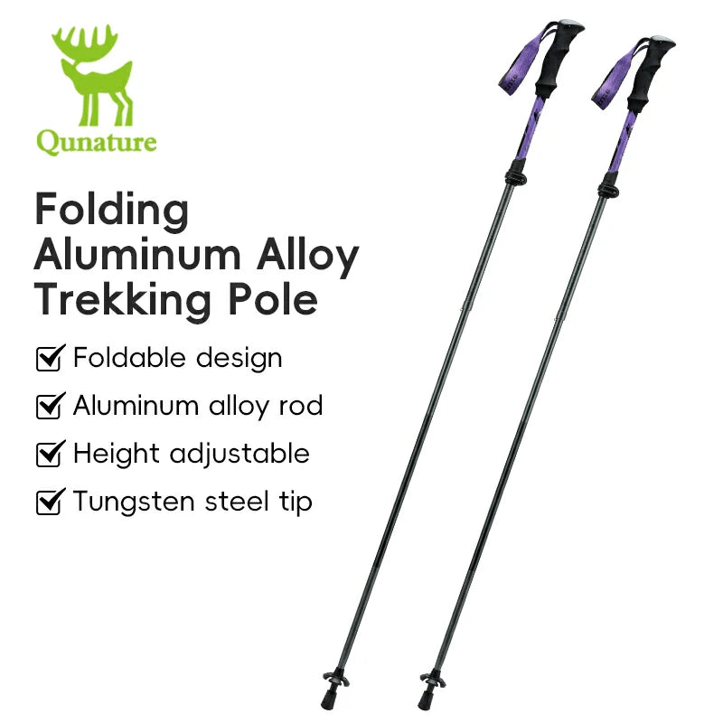 A foldable, adjustable, and lightweight aluminum trekking pole with a black grip and a silver tip.