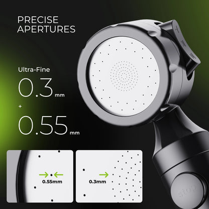 Close-up of a black and silver shower head with white spray aperture discs, shown with text reading 'PRECISE APERTURES' and aperture sizes 0.3 mm and 0.