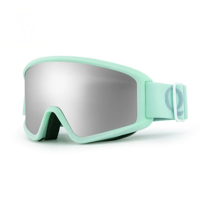 Mint green goggles with silver lenses on a white background