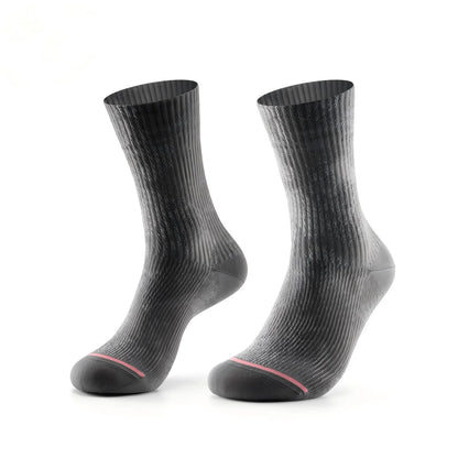 A pair of dark gray ribbed crew socks with a thin pink accent line near the toes, displayed against a solid white background.