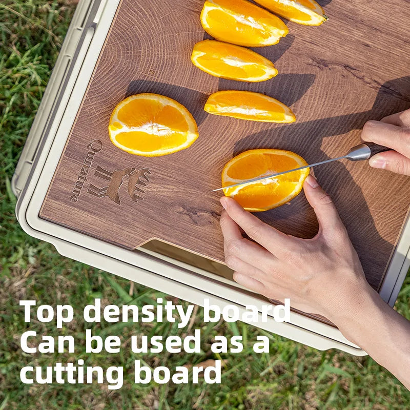 Person cutting oranges on a wooden cutting board with text 'Top density board Can be used as a cutting board'.