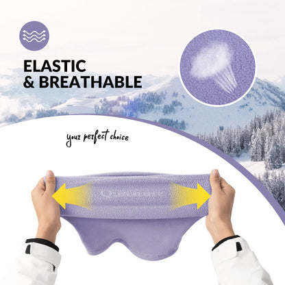 Purple eye mask with elastic band being stretched, set against a snowy mountain background.