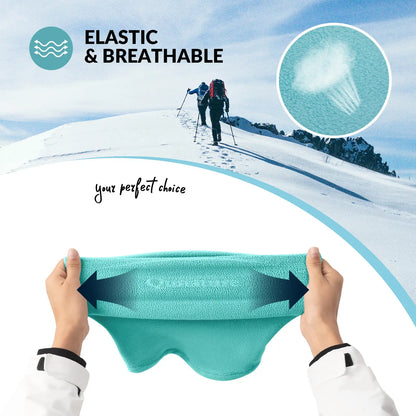 Teal fabric with air venting design held by hands, snowy landscape with hikers in the background, emphasizing elasticity and breathability.