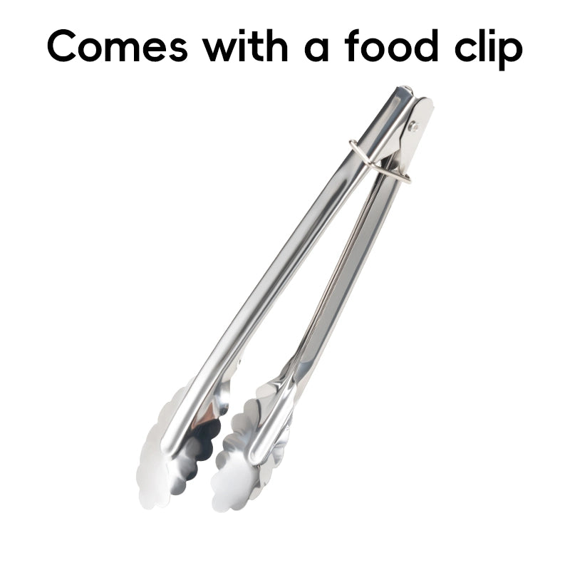 Metallic tongs with a food clip on a white background