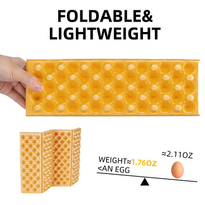 Foldable and lightweight ice cube tray with a hand holding it, showing its size compared to an egg.