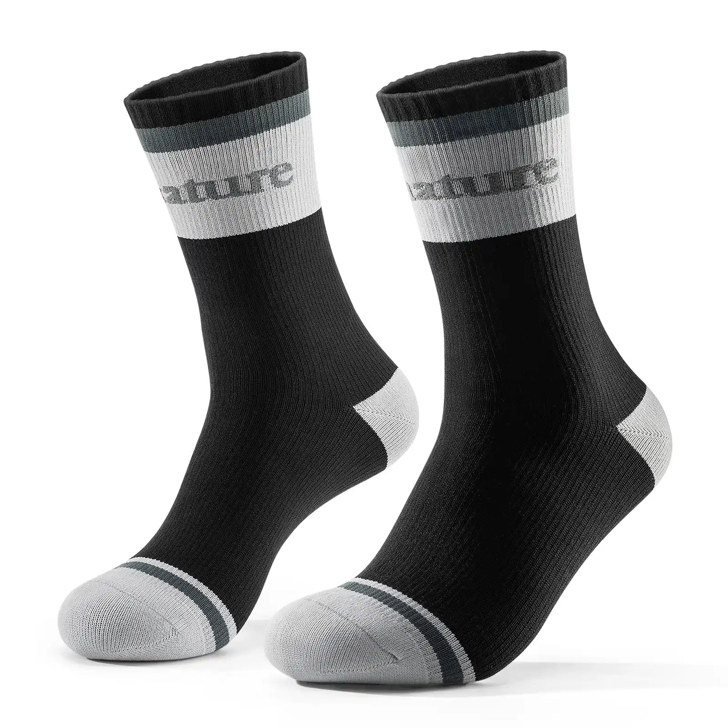 Pair of black socks with gray accents on a white background