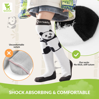 Child wearing panda-themed socks with a focus on comfort and shock absorption, featuring the brand 'Qunature'.