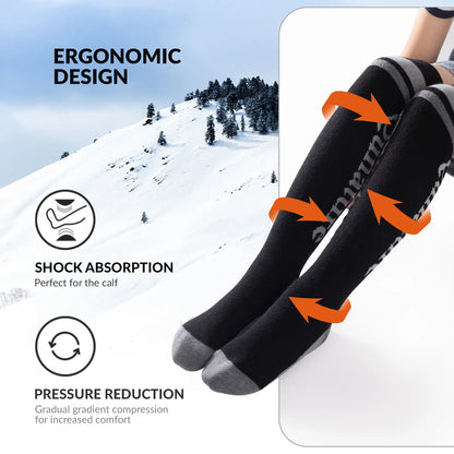 Black socks with orange accents on a snowy mountain background, featuring ergonomic design text and graphics.