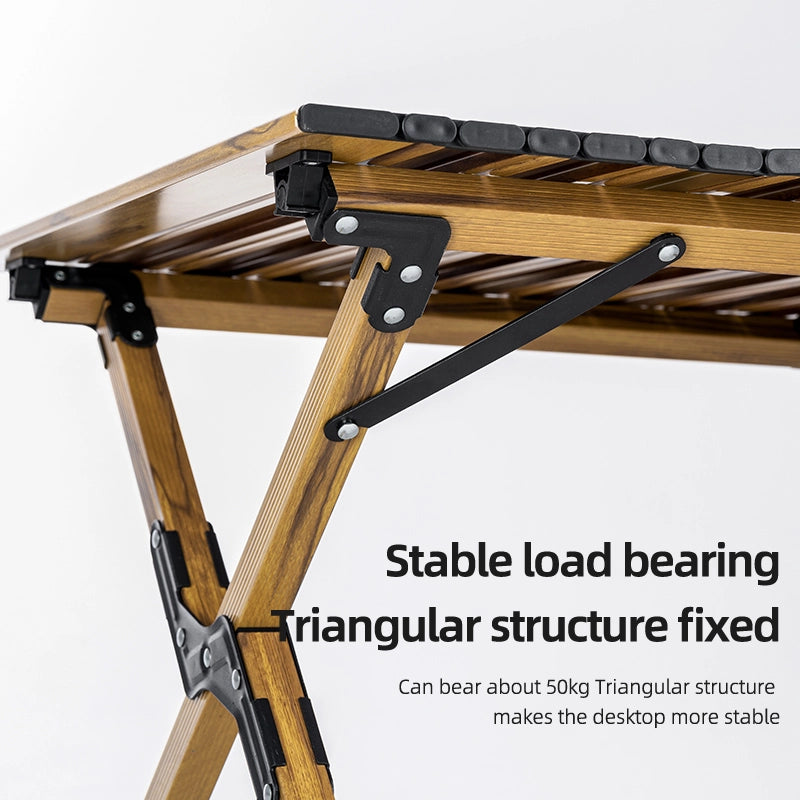 Wooden folding table with metal brackets on a white background