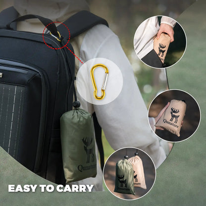 Backpack with a carabiner and small bags, featuring the Qumara brand.