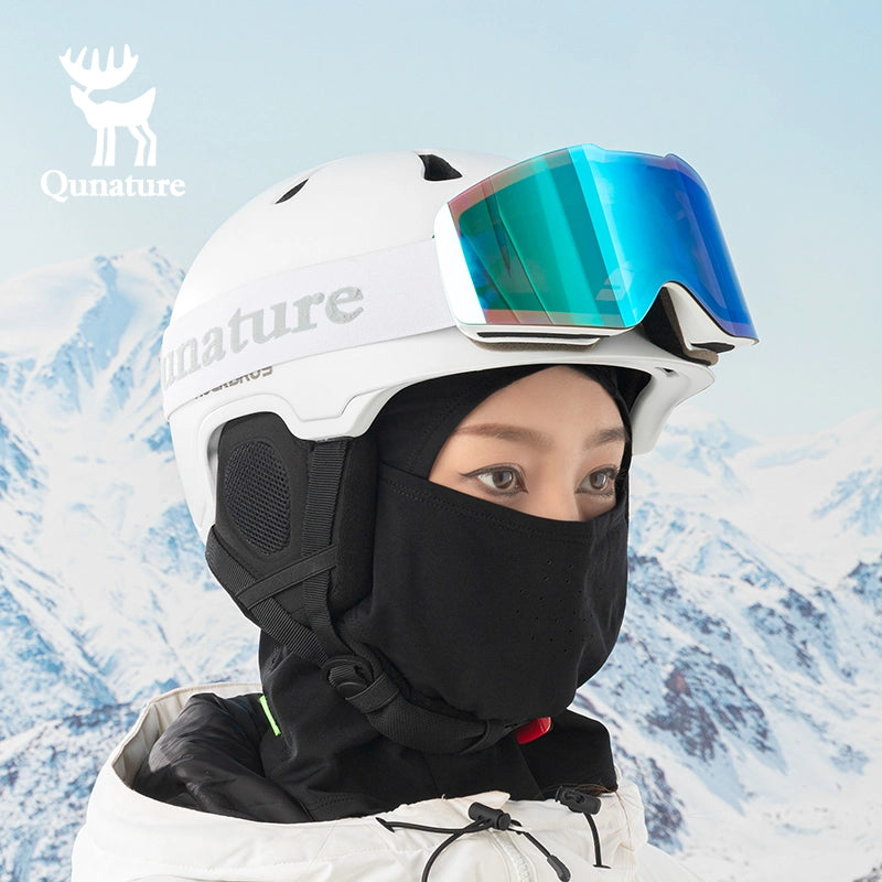 Person wearing a white helmet with blue goggles and black balaclava against a snowy mountain background, featuring the Ounature brand.