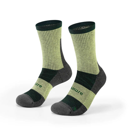 A pair of crew-length athletic socks in olive green and dark gray, featuring a ribbed knit upper, dark green cuffs, and the brand name 'nature' printed on the side.
