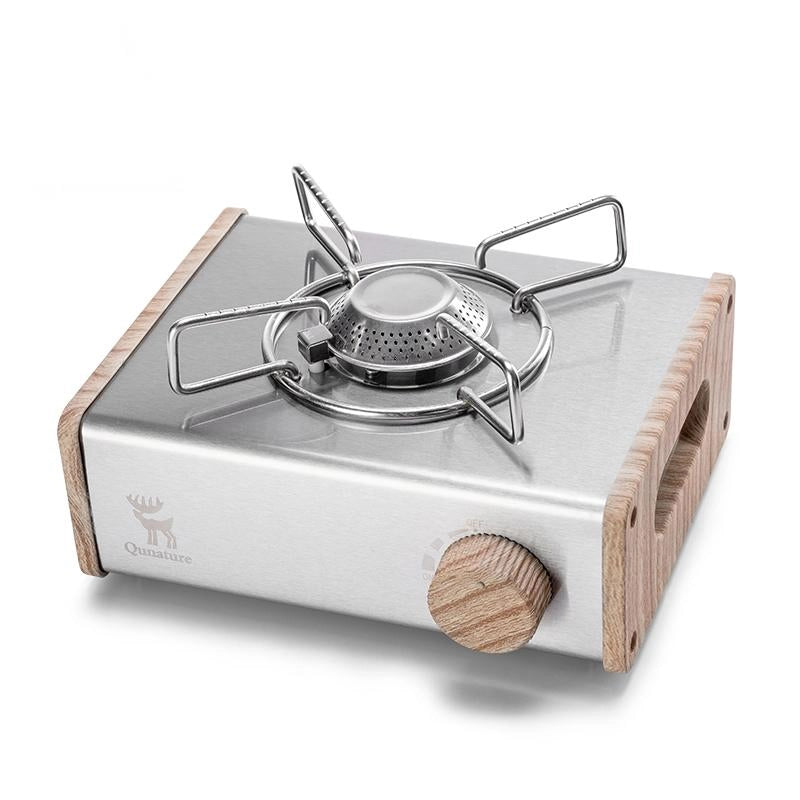 Portable gas stove with wooden accents on a white background