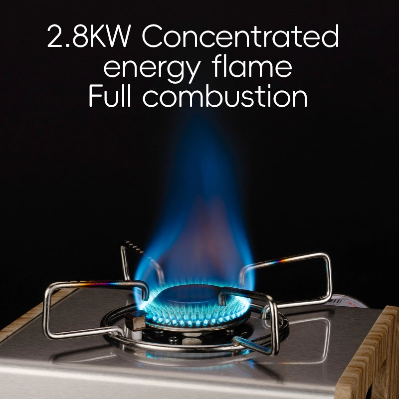 Gas stove with blue flame on a black background, highlighting concentrated energy flame and full combustion.