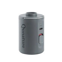 Gray cylindrical device with 'Qunature' branding on a white background