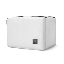 White suitcase with a brand logo on a white background