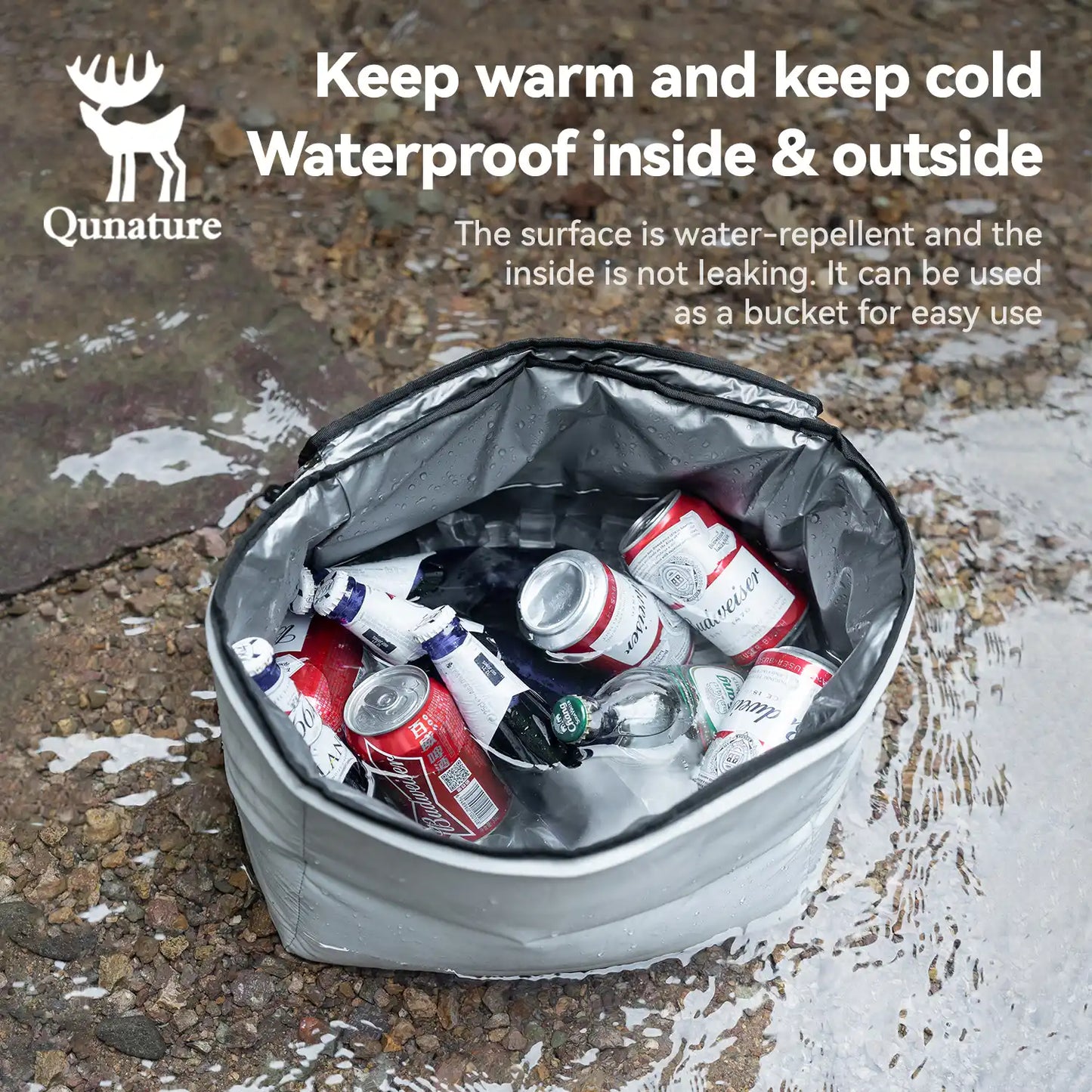 Insulated cooler bag with drinks on a wet pavement, featuring Qunature branding.