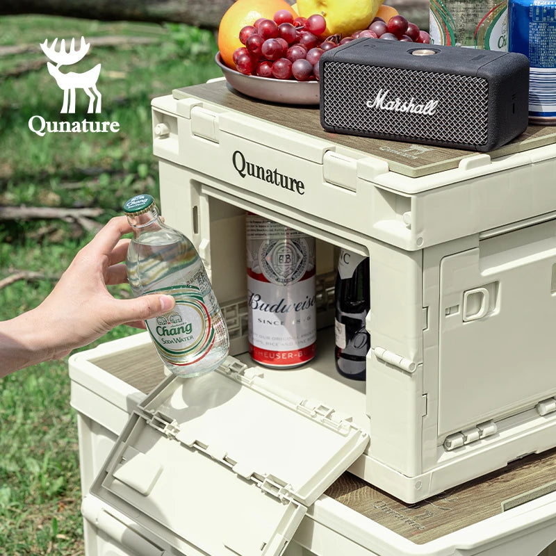 Qunature cooler box with drinks and a Marshall speaker outdoors