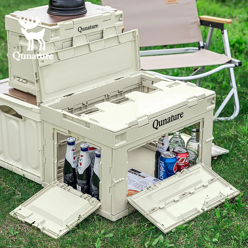 Qunature cooler box with open lid showing drinks on grass