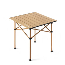 Portable folding table with wooden surface on a white background