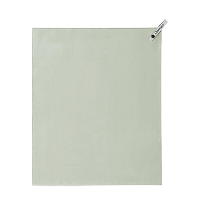 A light sage green rectangular towel or cloth with a small white brand tag in the top-right corner, shown flat against a plain white background.
