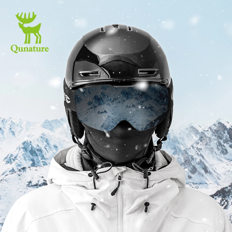 Person wearing a black helmet and goggles with a snowy mountain background, featuring the Qunature brand.