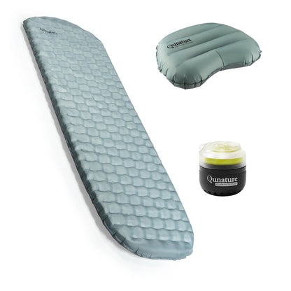 An inflatable camping sleeping pad and its pump set from Qunature, displayed on a clean white background. The sleeping pad is shown inflated and laid out diagonally, with the deflated pad and the black manual pump shown in the upper right and lower right corners.