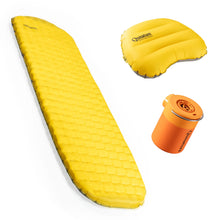 Yellow inflatable sleeping pad with pillow and pump on a white background