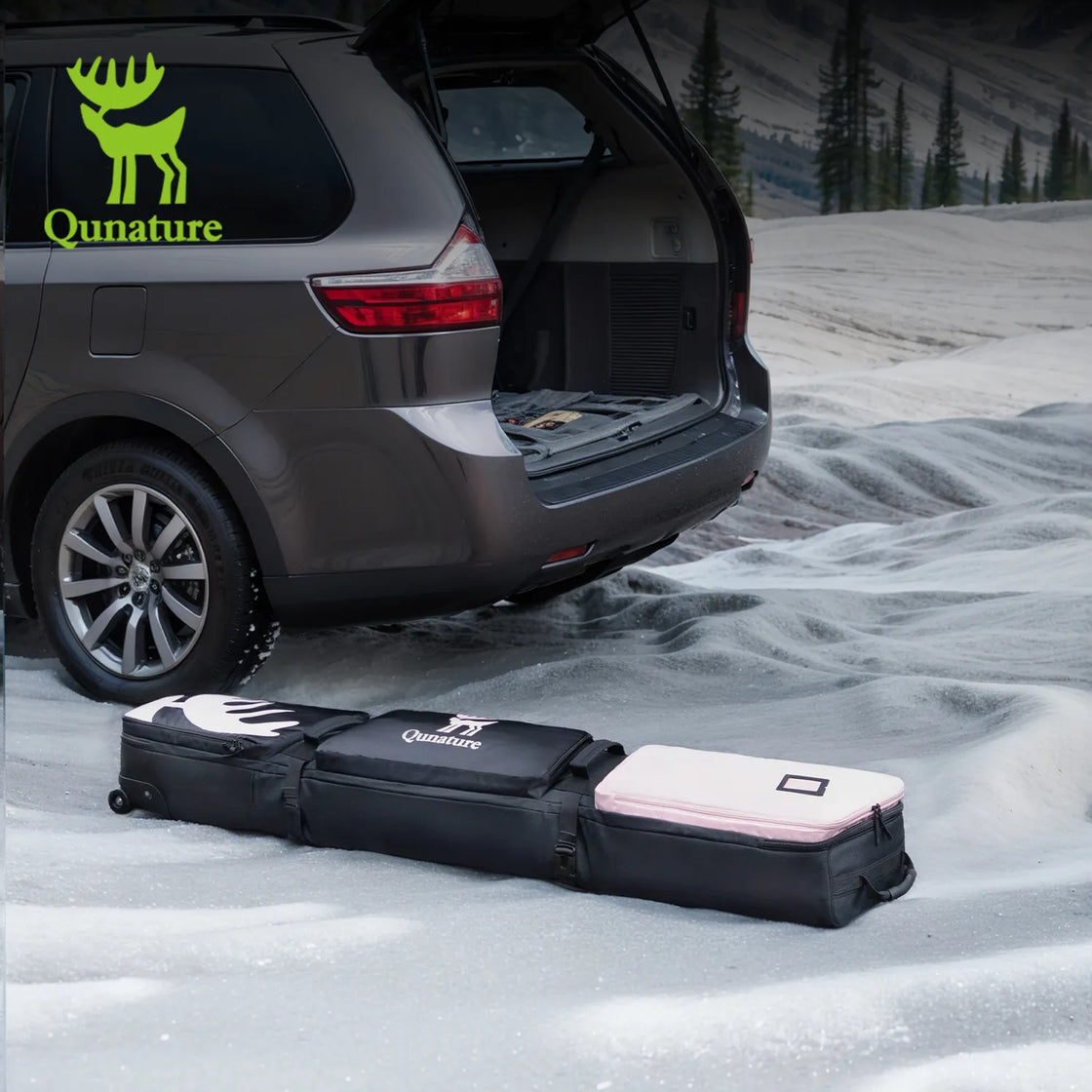 This pink snowboard bag with PU wheels is lying in the snow next to a car with its trunk open.