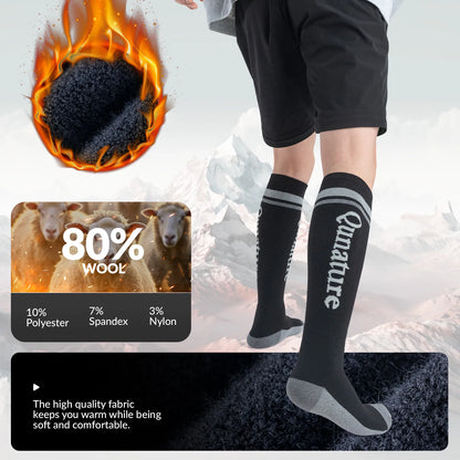 Black knee-high socks with brand logo, wool content illustration, and flame graphic on a white background.