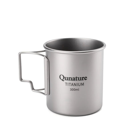 A 300ml titanium camping mug by Qunature, featuring a brushed metallic silver finish and a fold-out handle, shown on a clean white background.