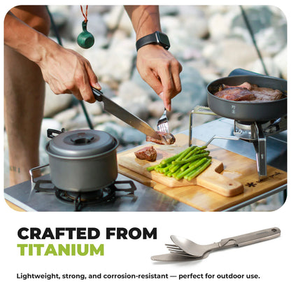 Person cooking outdoors with titanium cookware and utensils.