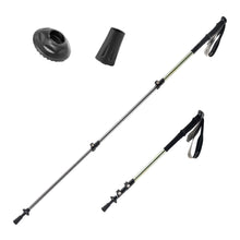 Two black hiking poles with adjustable components on a white background
