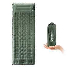 A lightweight inflatable green camping sleeping pad with built-in pillow