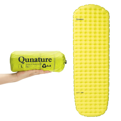 Yellow sleeping pad with rolled-up sleeping pad and 'Qunature' branding on a white background