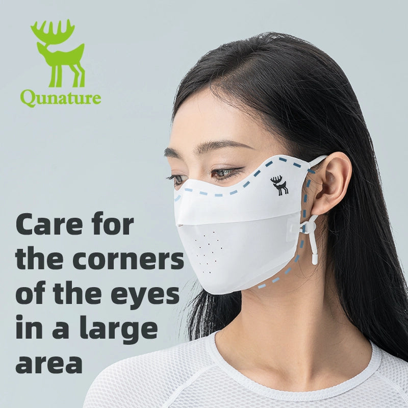 Woman wearing a face mask with Qunature branding on a gray background