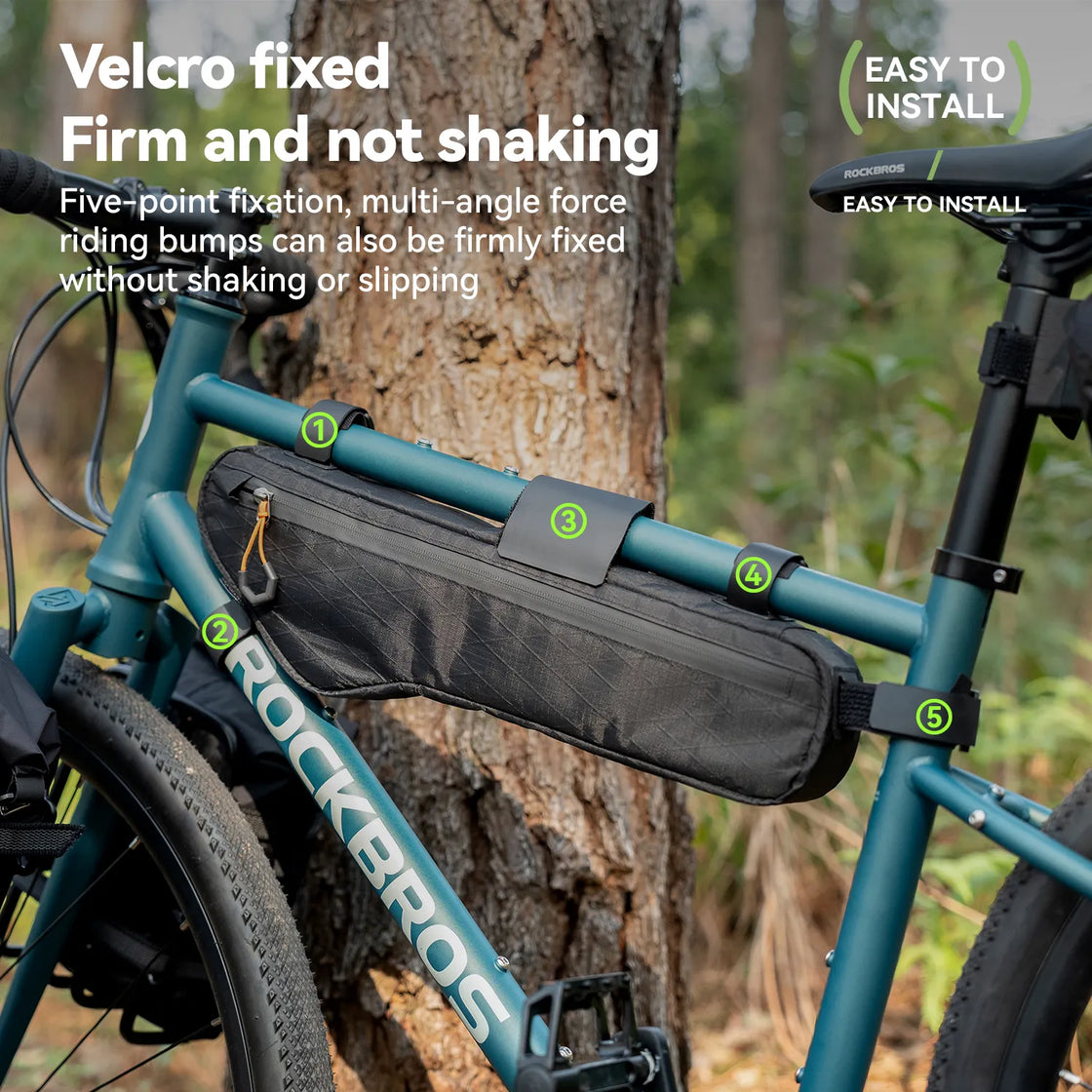 A large capacity down tube bike bag is securely mounted on a blue bicycle outdoors