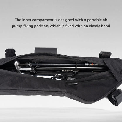 Black bag with a portable air pump inside, on a gray background