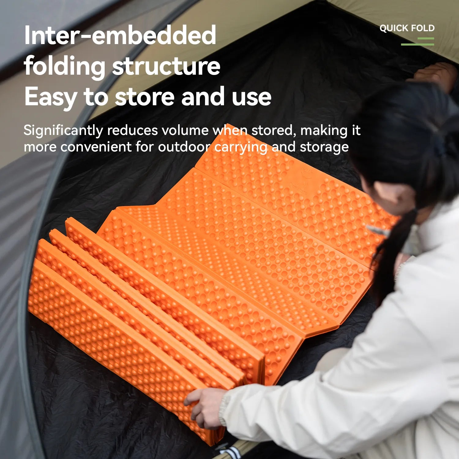 Orange inter-embedded folding structure being used inside a tent with text highlighting its convenience for outdoor carrying and storage.