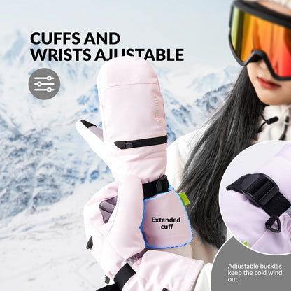 Person wearing pink ski gloves with adjustable cuffs and wrists, set against a snowy mountain background.