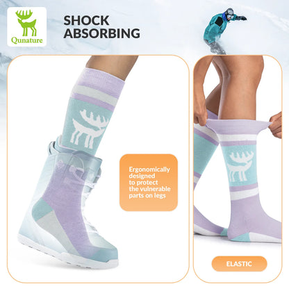 Colorful socks with a deer design worn by a person, featuring text about shock absorption and elasticity.
