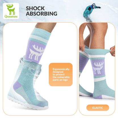 Colorful socks with a deer design worn by a person, featuring text about shock absorption and elasticity.
